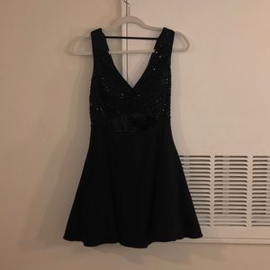 BEBE mini black sequin cut our dress !